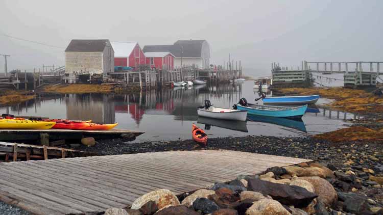 fishing shacks on the water